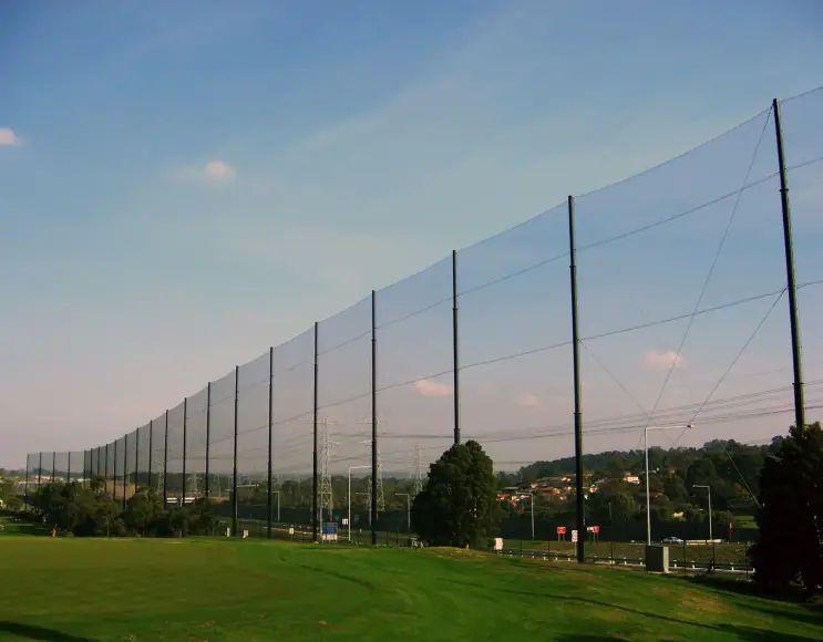 Golf course protection net