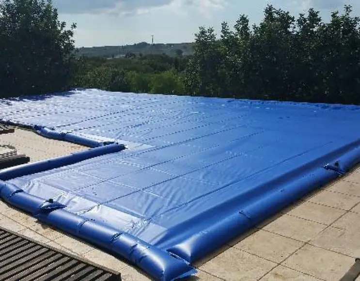 PVC swimming pool tarpaulin cover with eyelets, 650 gr with the provision of water bags