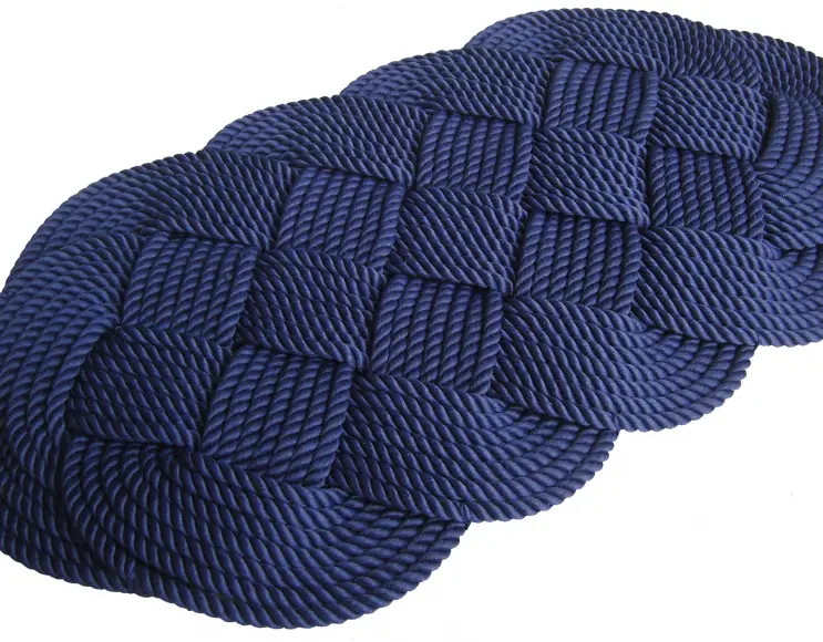 Hand woven rope doormat. Solid blue color. Elba model