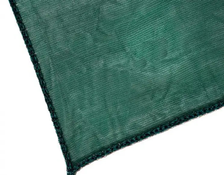 Shade cloth for covering parking lots and shelters in polyethylene, 190 gr / sqm. Green colour. edging with perimeter cord