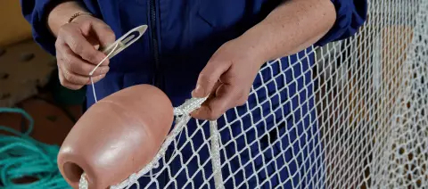 Nets for damming lakes.