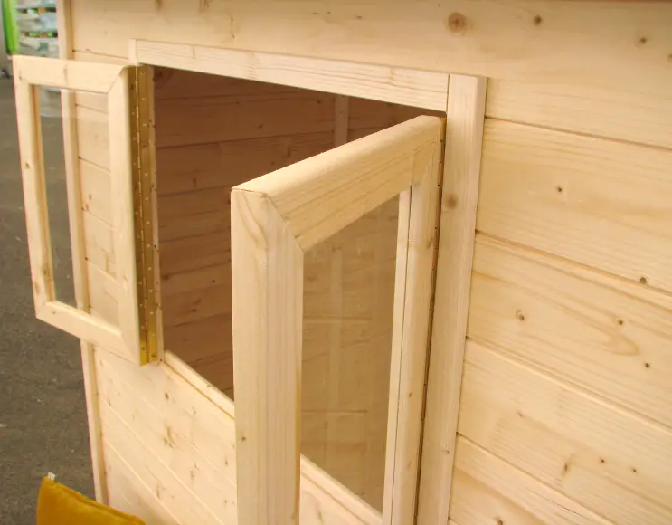 GRACE wooden house with bench and blackboards