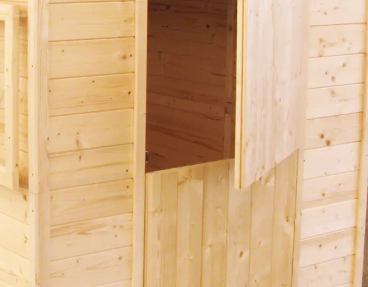 GRACE wooden house with bench and blackboards