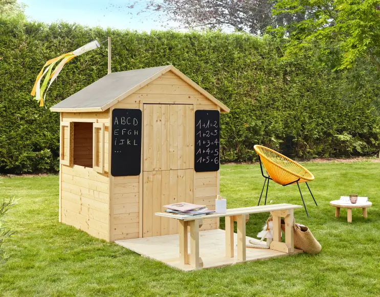 GRACE wooden house with bench and blackboards